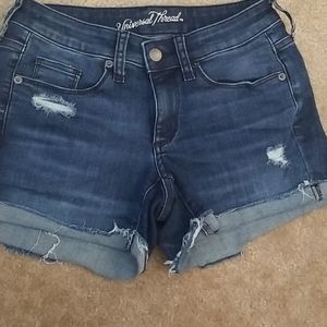 Dark wash distressed denim shorts